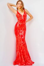 Model wearing Jovani 3263 red mermaid dress with plunging V-neckline