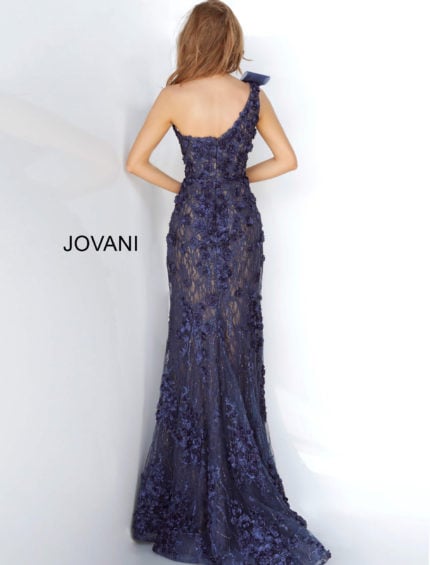 Model wearing Jovani 3375 navy evening gown with floral lace and mermaid silhouette, back view.