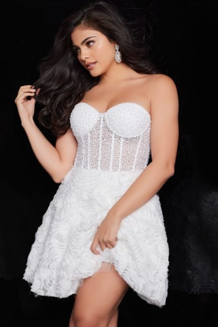 Model showcasing Jovani 36578 white dress from the front with intricate beadwork bodice.