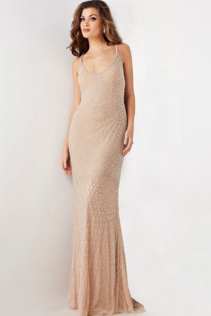 Model wearing Jovani 36609 nude gown with scoop neckline and intricate beading, front view.