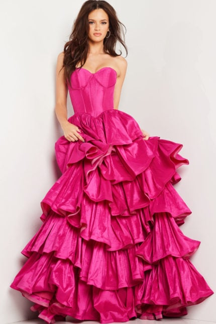 Model wearing Jovani 36619 fuchsia ball gown, back view.