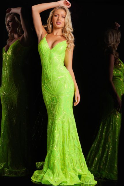 Model wearing Jovani 36656 green gown with sequined mermaid silhouette and V-neckline.