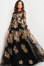 Front view of model in Jovani 36716 black gown with intricate gold floral designs.