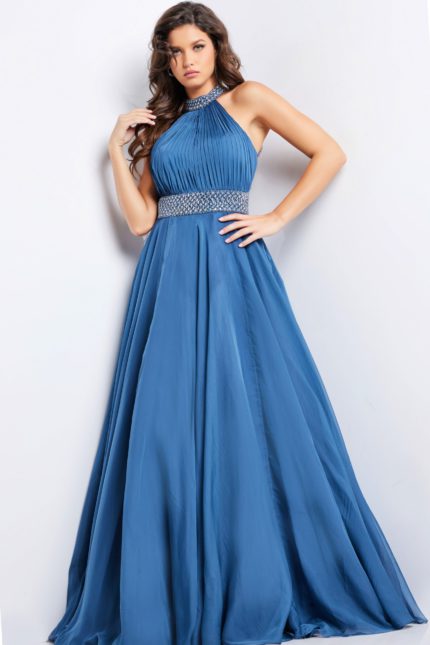 Model wearing Jovani 36749 navy gown with high neckline and elegant A-line skirt.