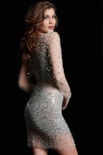 Model wearing Jovani 37055 silver dress with beadwork, back view