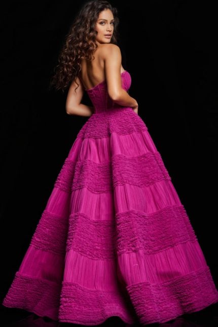 Model wearing Jovani 37157, full-length gown with sweetheart neckline in pink, back view.