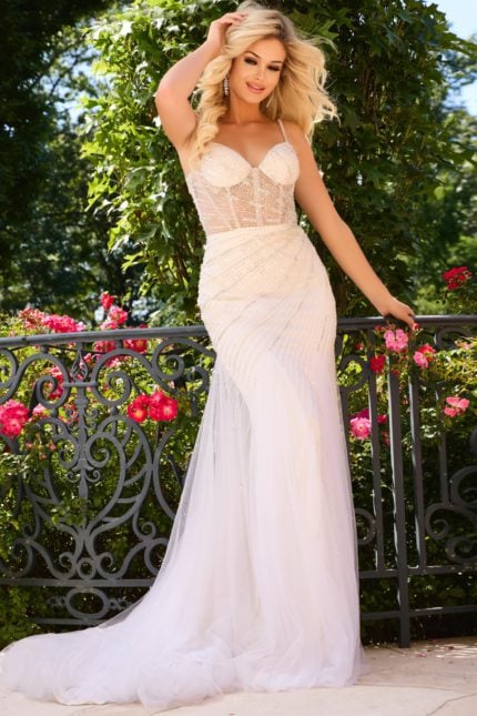 Model wearing Jovani 37201, a white gown with a fitted silhouette and sweetheart neckline.