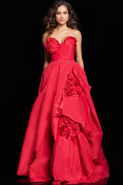 Model wearing Jovani 37266 red gown with rosette embellishments from front view.