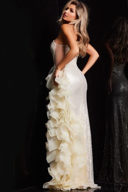 Model wearing Jovani 37344 beige gown with ruffle detail, back view.