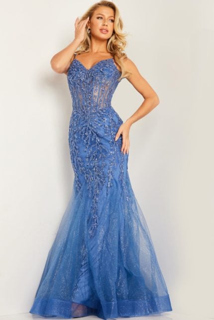 Model wearing Jovani 37416 blue mermaid gown, full length front view.