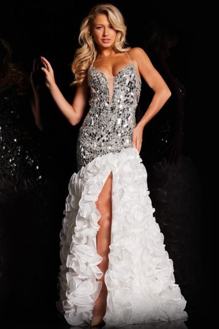 Model wearing Jovani 37588 gown with mirror embellishments and high slit front view.