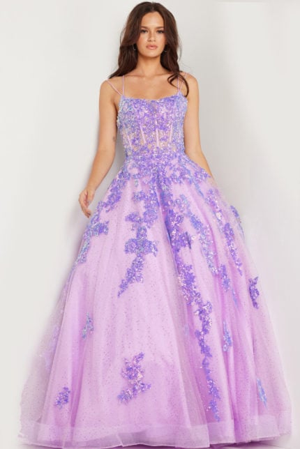 Model wearing Jovani 37700 lilac ball gown with floral appliqué and beadwork, front view.