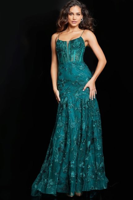 Model wearing Jovani 38004 green dress with floral detailing, front view.