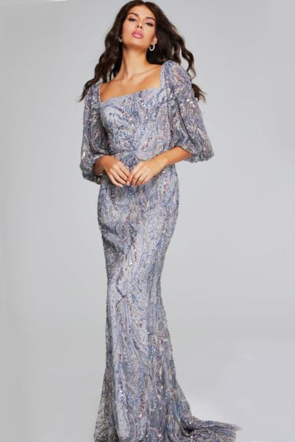 Model wearing Jovani 38110 elegant gray dress with square neckline and puff sleeves, front view.