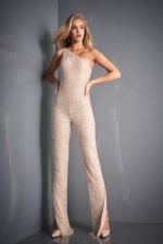 Model wearing Jovani 3816 nude jumpsuit with an asymmetrical neckline