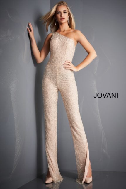 Model wearing Jovani 3816 nude jumpsuit with an asymmetrical neckline