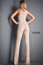 Back view of model wearing Jovani 3816 nude jumpsuit showing one-shoulder detail