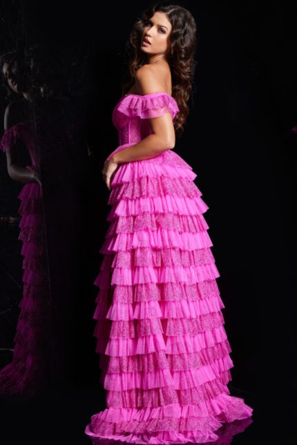 back view of model wearing 38251 pink ruffled dress