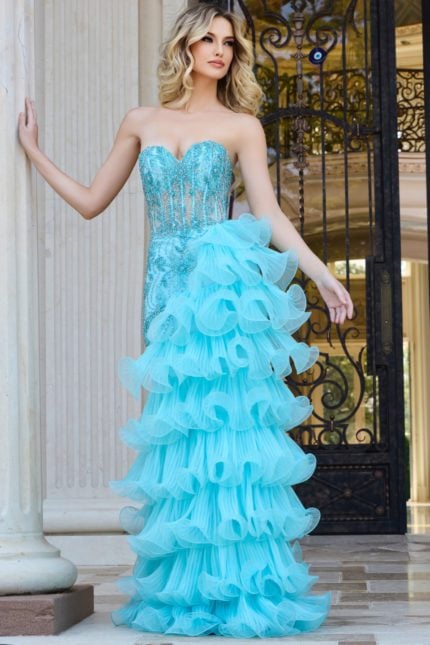 Front view of Jovani 38295 blue gown with intricate beadwork and ruffles.