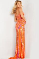 Model wearing Jovani 38300 orange gown, back view.