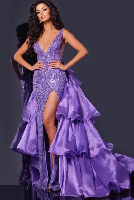 Model wearing Jovani 38336 purple gown with sequined embroidery and deep V-neckline