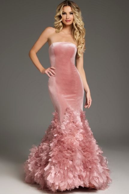 Model in Jovani 38496 pink mermaid gown, showcasing the elegant strapless design.