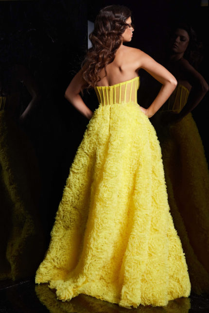 Back view of Jovani 38674 yellow gown with floral appliqué.