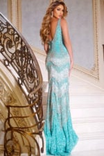 model wearing 38847 aqua gown back view with shimmering details