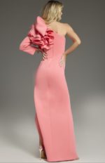 Back view of model wearing Jovani 38928 fuchsia gown with ruffled one-shoulder.