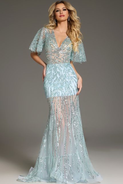 Model wearing Jovani 39008 blue gown with V-neckline and sequins, front view.