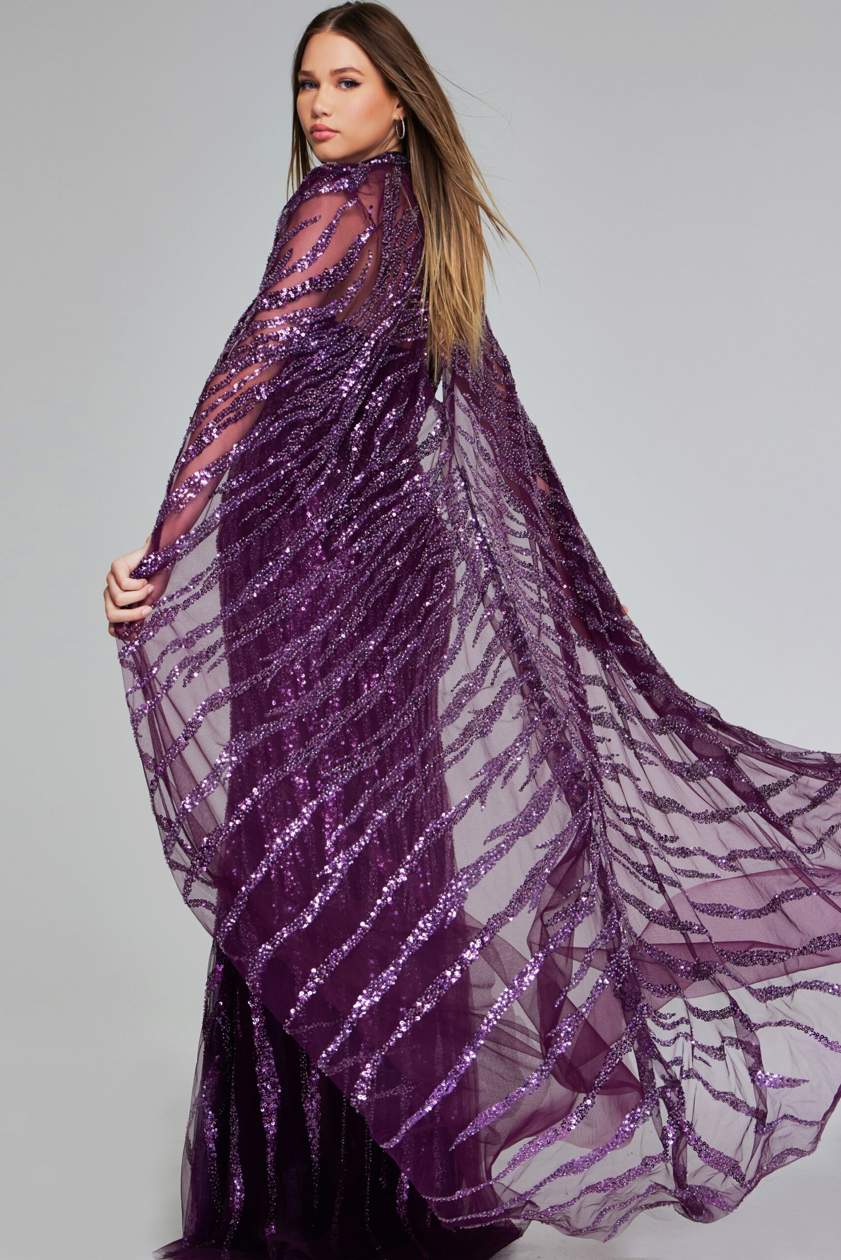 Enchanting Purple Sequin Gown with Dramatic Cape 39046