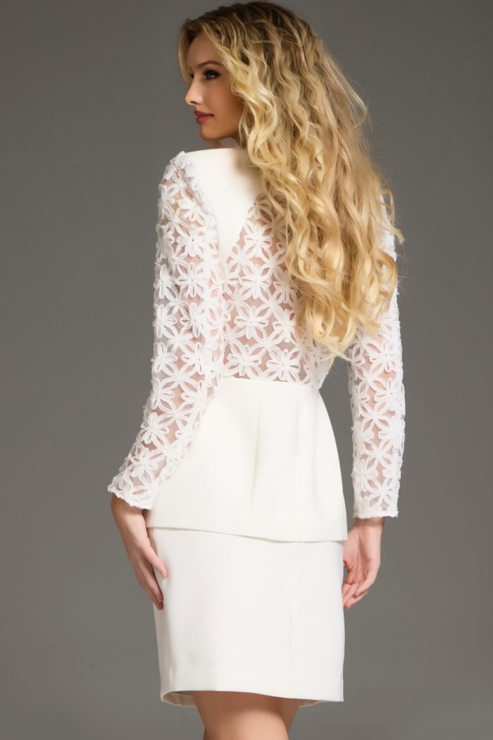 Model wearing Jovani 39075 ivory dress, back view.