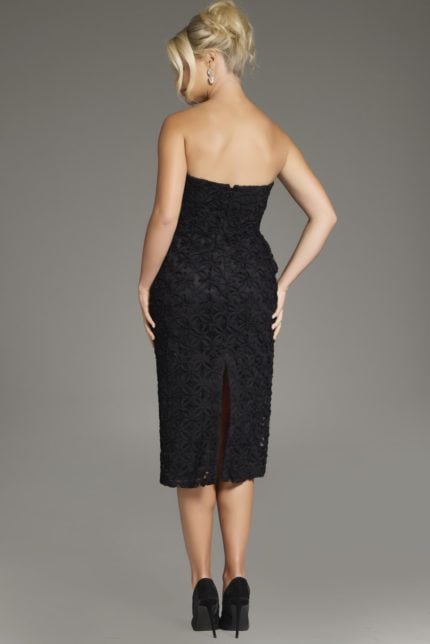 Model wearing Jovani 39076 black dress with floral embroidery, front view