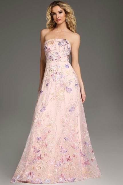 Model wearing Jovani 39144 pink dress with floral embroidery, front view.