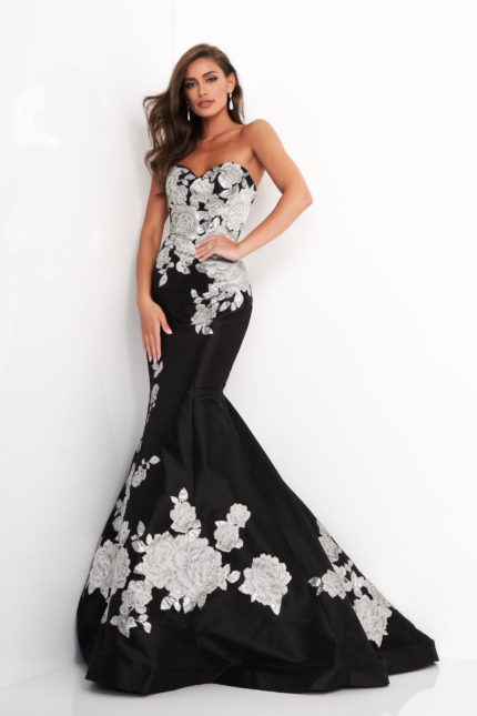 Model wearing Jovani 3917 black gown with silver floral embroidery, main front view.