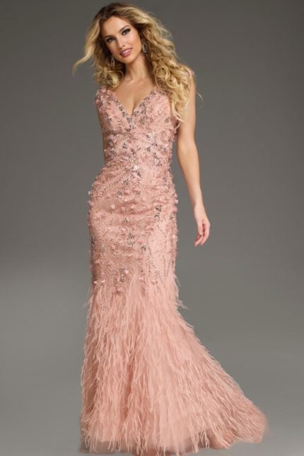 Model wearing Jovani 39174 blush gown with floral embellishments and feathered skirt, main front view