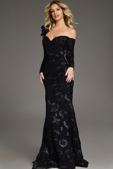 Model wearing Jovani 39266 black gown showcasing the back details and floral patterns.