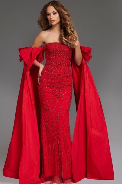 Model wearing Jovani 39377 front view with red gown, strapless, embellished bodice, and detachable cape.