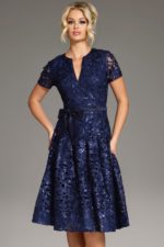 model wearing Jovani 39427 navy dress showing full front view