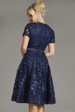 model wearing Jovani 39427 navy dress back view