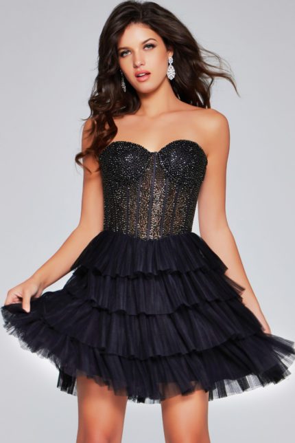 Model wearing Jovani 39629 black dress with a beaded bodice and tulle skirt.