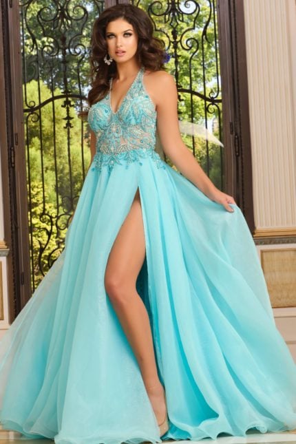 Model showcasing Jovani 39642, blue gown with a high slit and halter neckline.