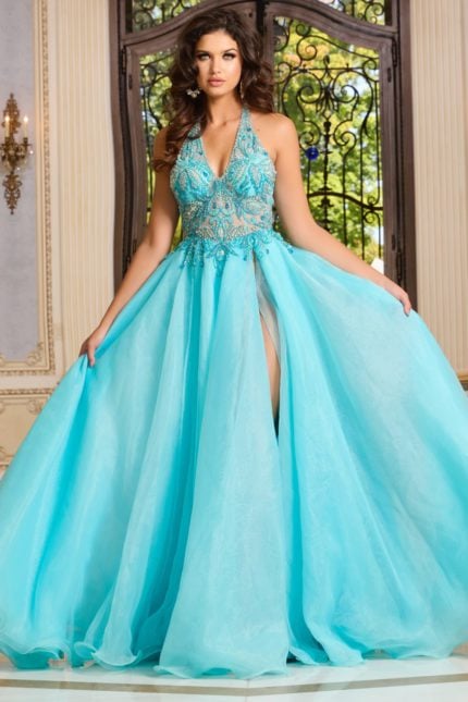 Model wearing Jovani 39642, an embellished blue halter neckline gown with a high slit.