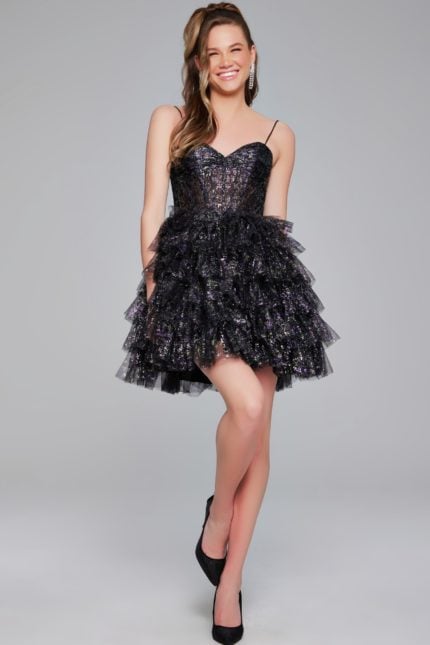 Model wearing Jovani 39654 black cocktail dress with sweetheart neckline and layered ruffle skirt.