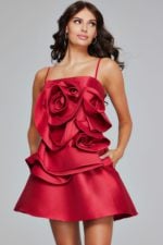 Model wearing Jovani 39750 red dress with floral applique and straight neckline, front view.