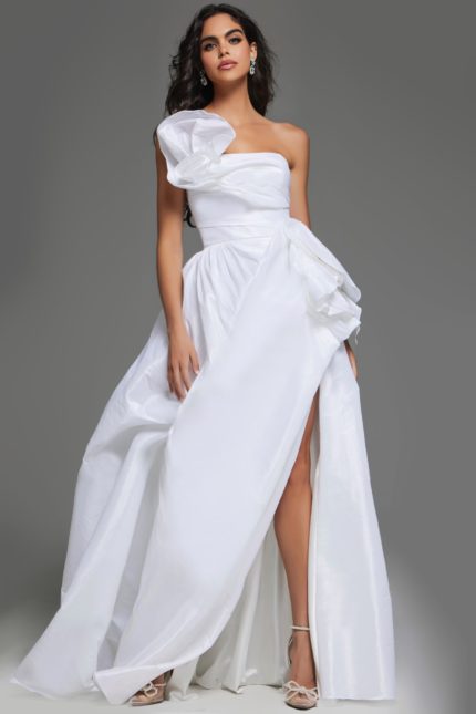 Model wearing Jovani 39796 white dress with ruffled shoulder detail and high slit, front view.