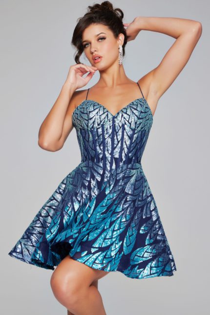 Model wearing Jovani 39928 royal blue dress with leaf pattern, front view