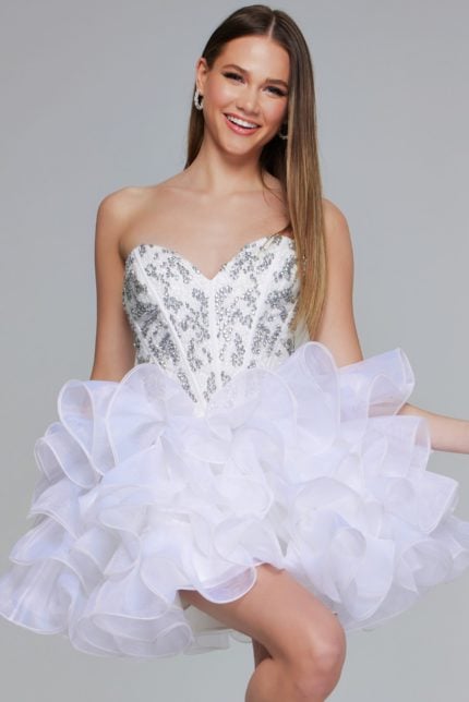 Model wearing Jovani 39932 off-white short dress with sweetheart neckline and ruffled skirt.