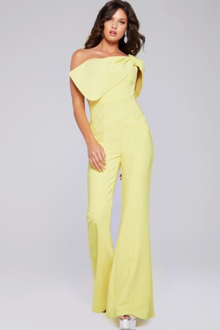 Model wearing Jovani 39961 yellow one-shoulder jumpsuit, alternative front view.