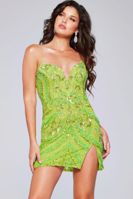 Model wearing Jovani 40003 green sequin short dress with sweetheart neckline.